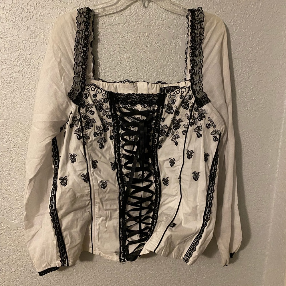 This is a Lane Bryant lace embroidered corset styled Ladies blouse. Sz 16-18/1